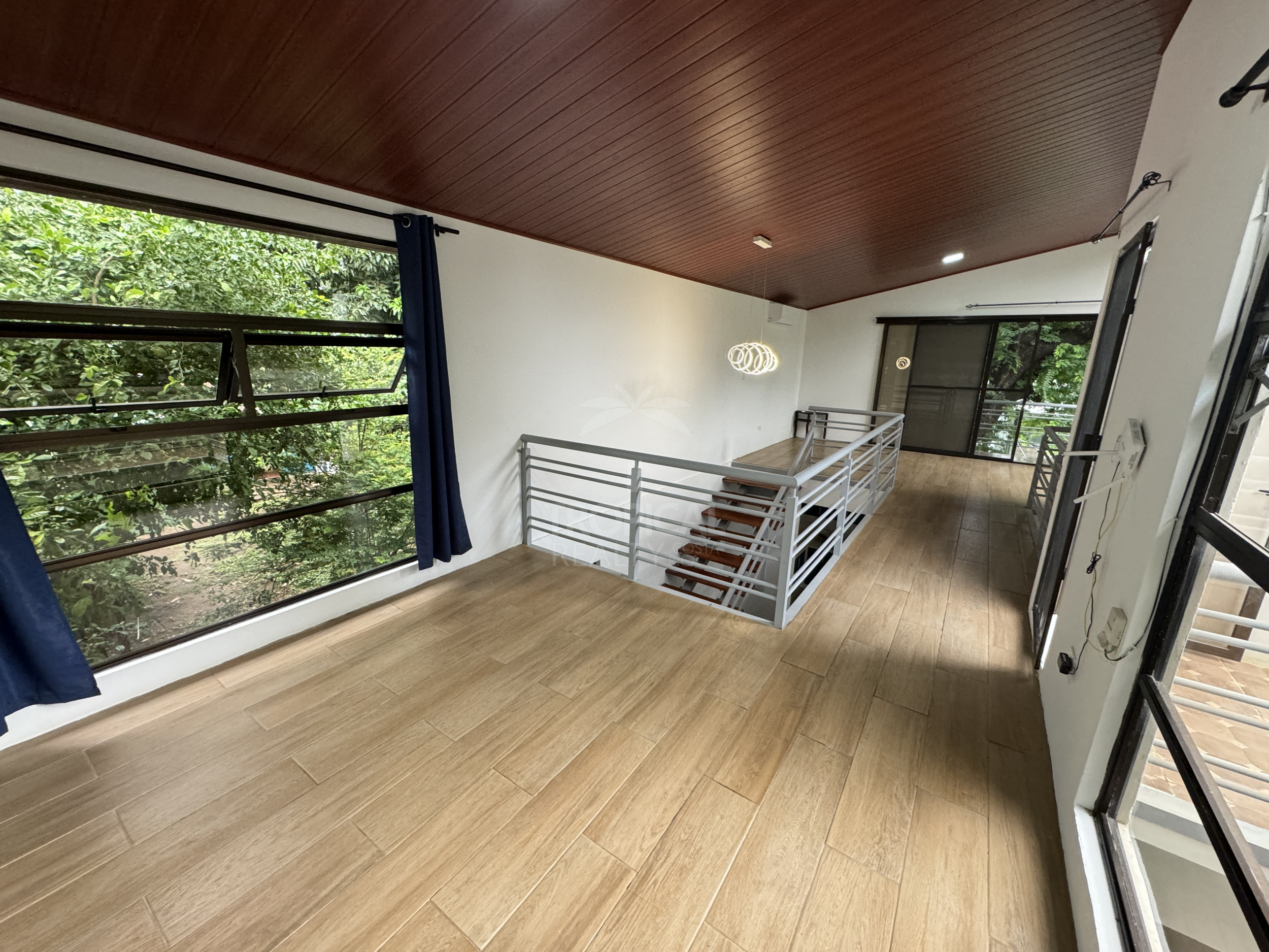 Modern Home for Sale in Playas del Coco – 2 Bedrooms, Fenced Garden, and Pool Potential