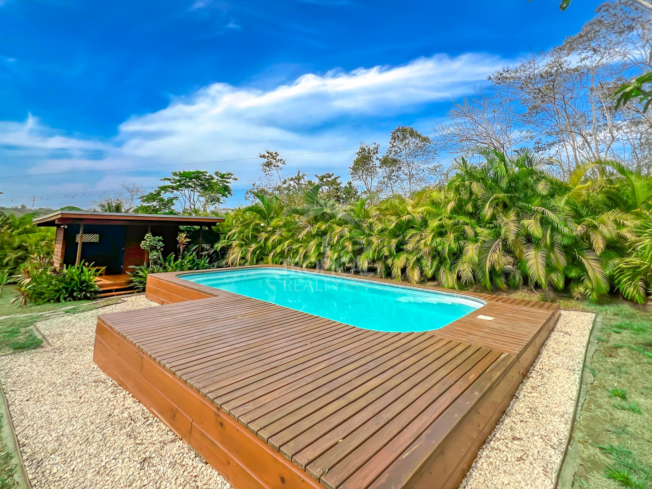 Turnkey Rental Opportunity: Charming Lodges with Pool Near Santa Teresa Beach