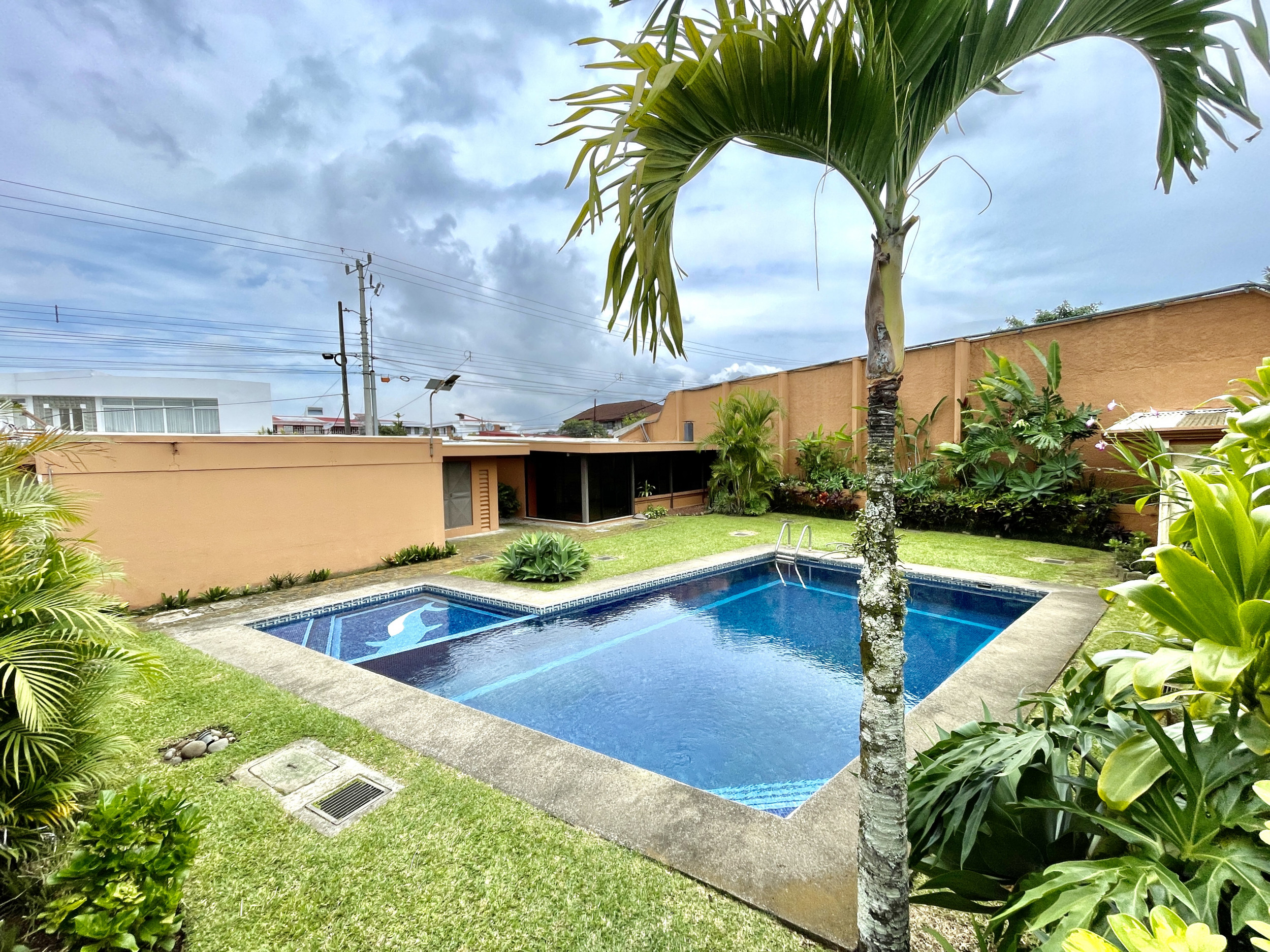 Single-Level Gem in Moravia: Secure Condo Living with Pool, BBQ, and More! SOLD