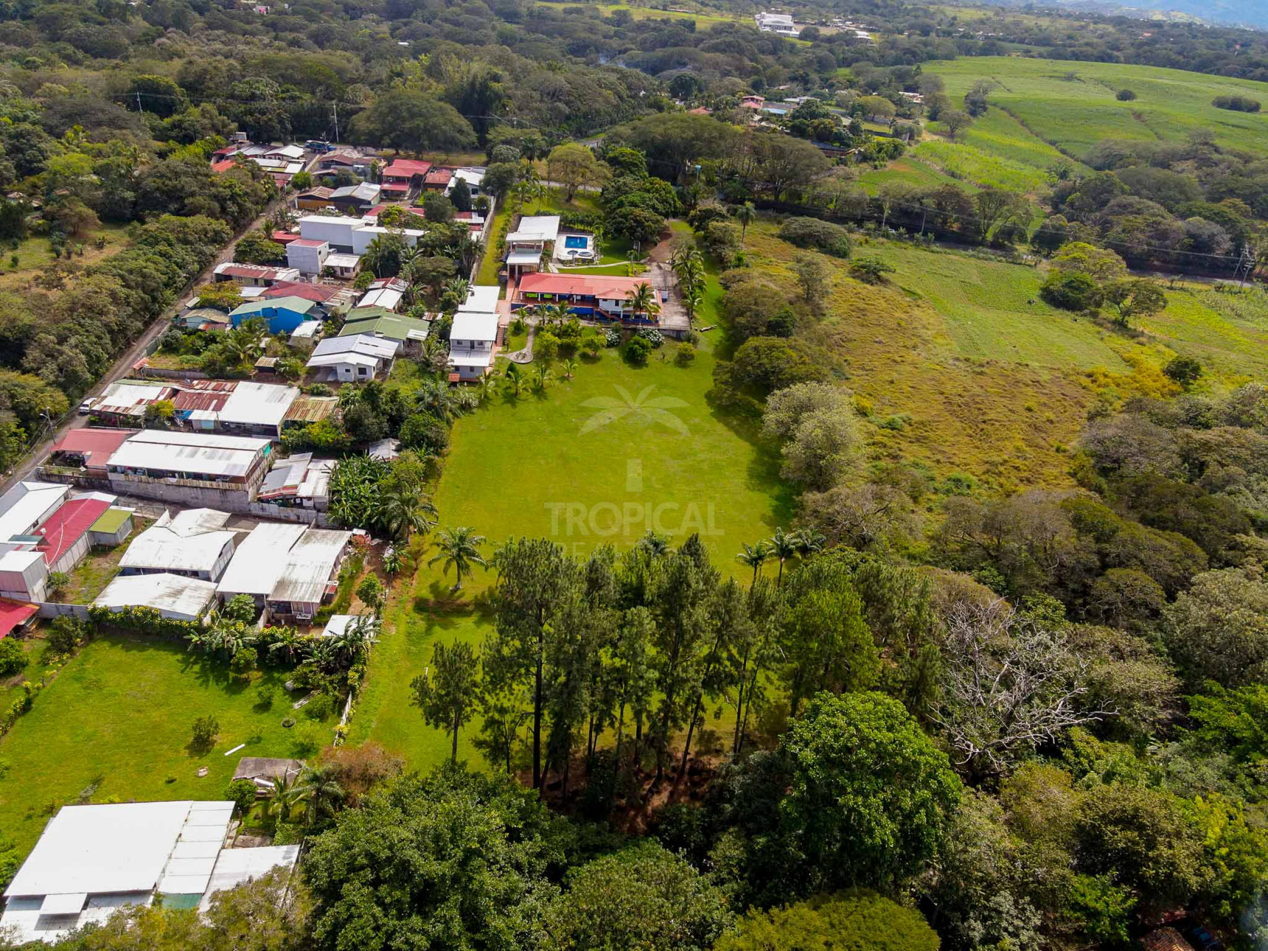 Commercial Property for Sale in La Garita – Riverfront with High Development Potential
