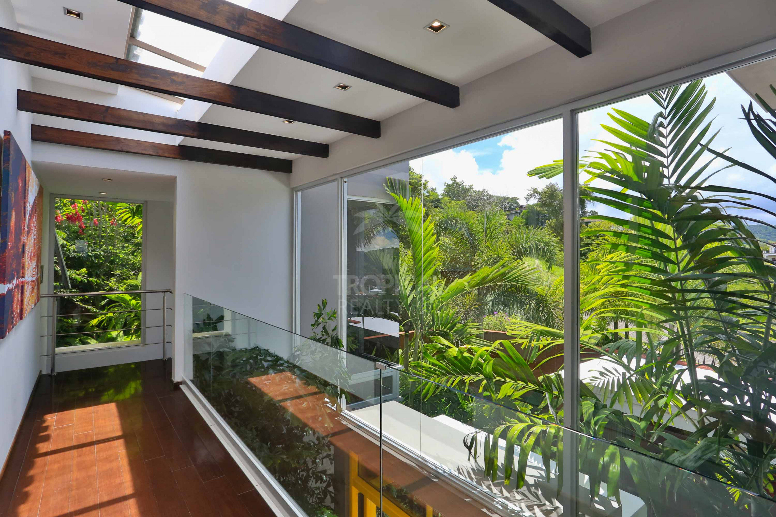 Luxury Home for Sale in Ciudad Colón – Infinity Pool & Forest Views