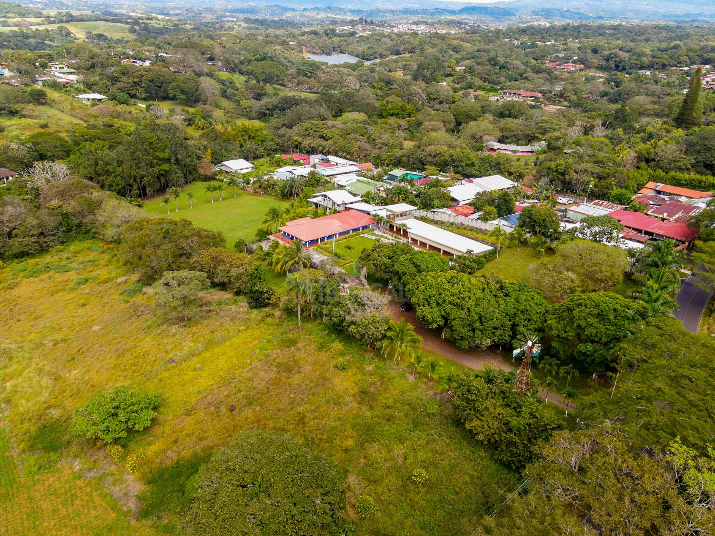 Commercial Property for Sale in La Garita – Riverfront with High Development Potential