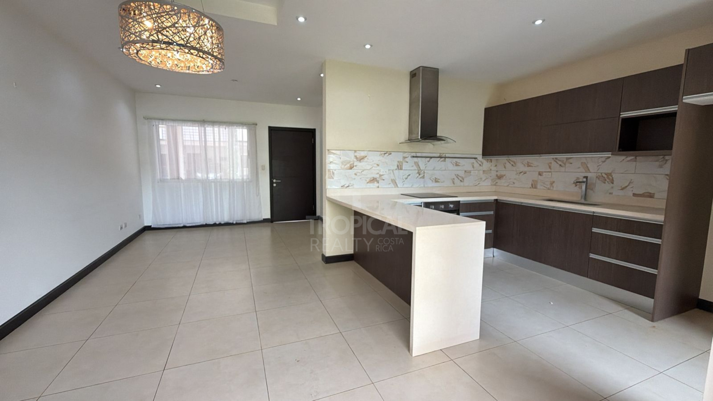 Contemporary Townhome for Sale in Pozos de Santa Ana – Comfort, Location & Great Value