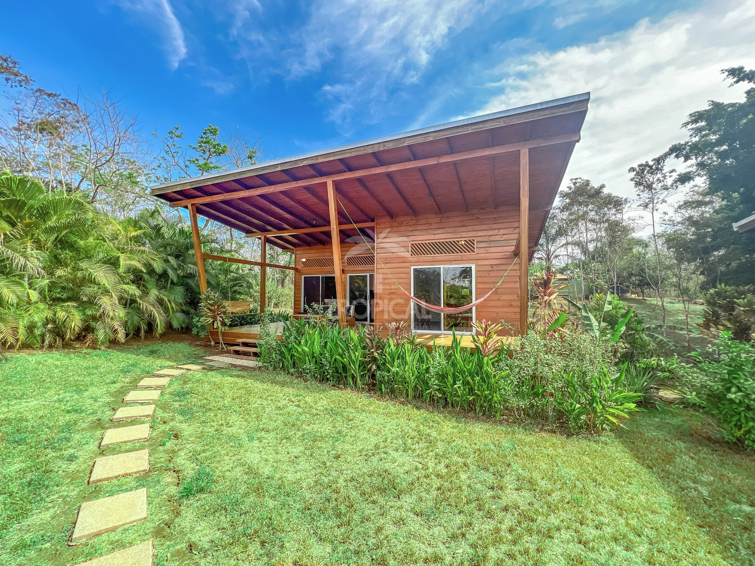 Turnkey Rental Opportunity: Charming Lodges with Pool Near Santa Teresa Beach