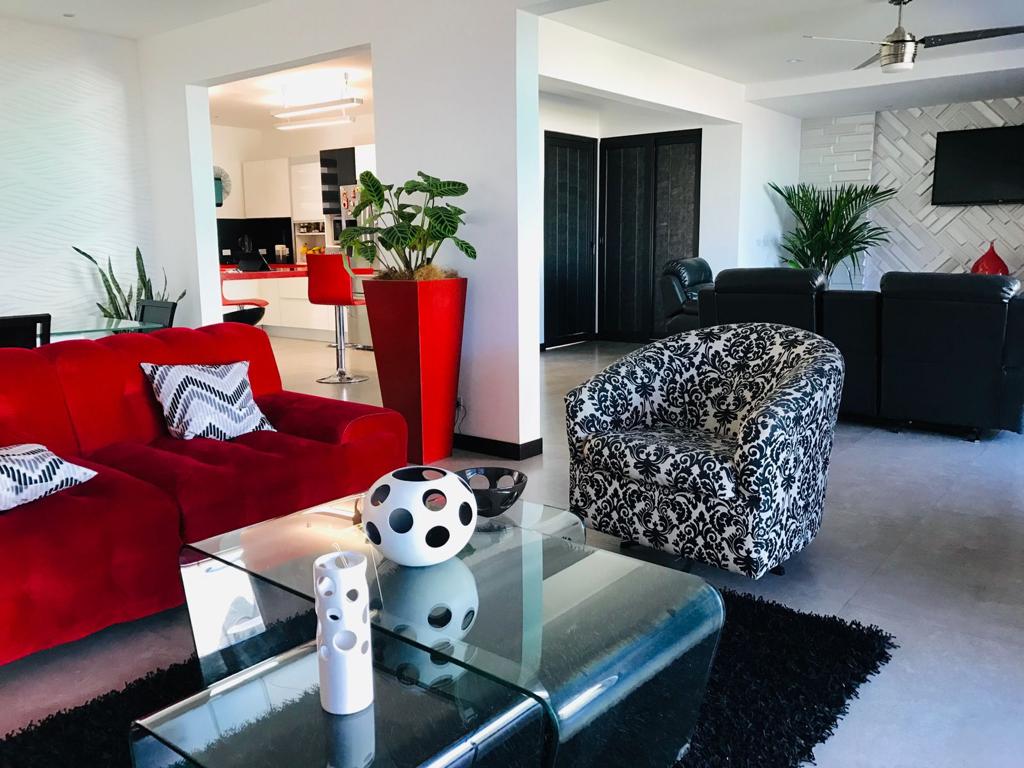 A contemporary residence located in Guachipilín Norte condominium is now available for sale SOLD