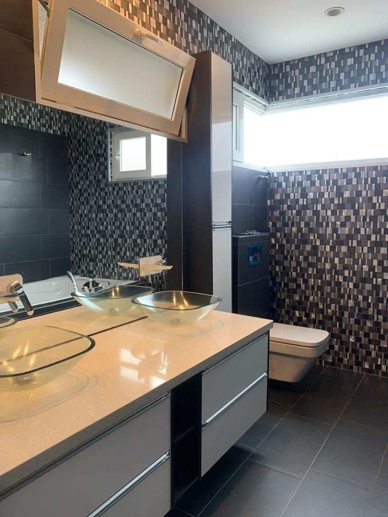 A contemporary residence located in Guachipilín Norte condominium is now available for sale SOLD