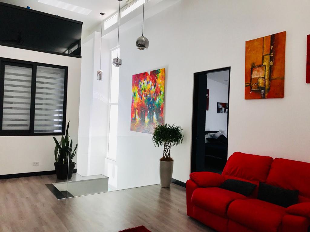 A contemporary residence located in Guachipilín Norte condominium is now available for sale SOLD