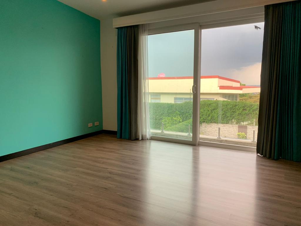 A contemporary residence located in Guachipilín Norte condominium is now available for sale SOLD