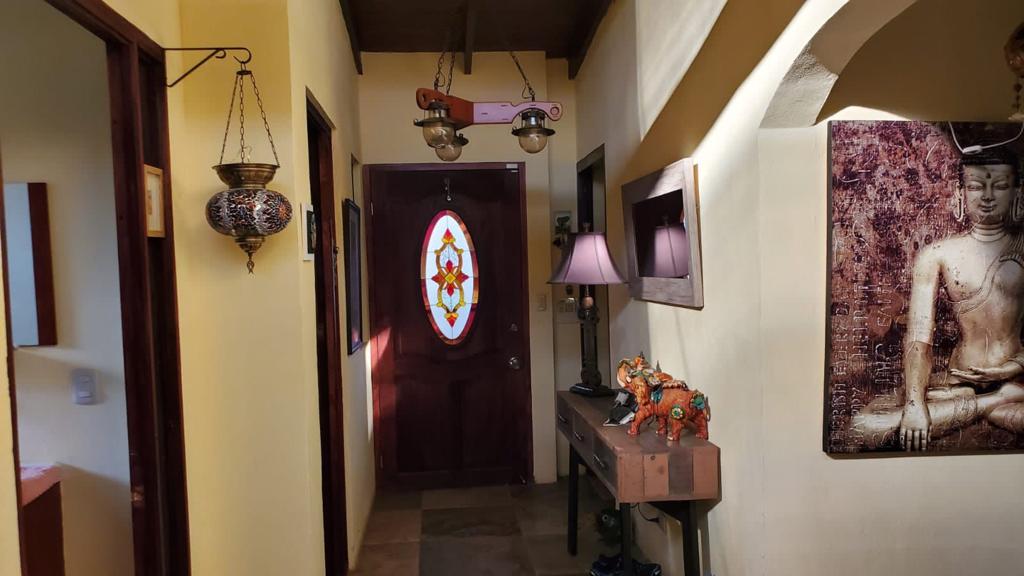 Nature-Enveloped Elegance: 3BR Home with Views in Ciudad Colon, Only 6 Blocks from the Center