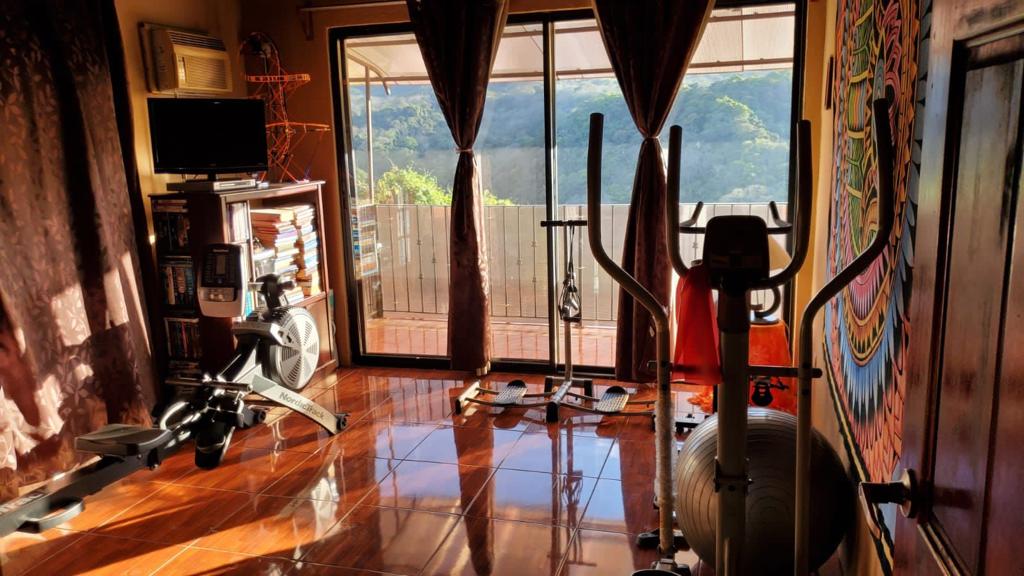 Nature-Enveloped Elegance: 3BR Home with Views in Ciudad Colon, Only 6 Blocks from the Center