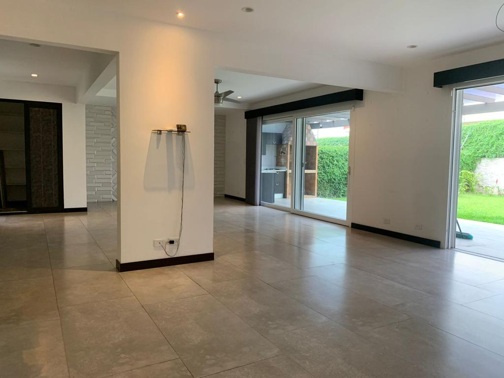 A contemporary residence located in Guachipilín Norte condominium is now available for sale SOLD