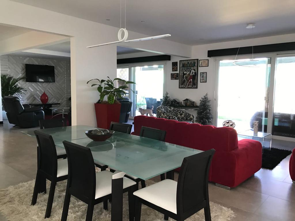A contemporary residence located in Guachipilín Norte condominium is now available for sale SOLD