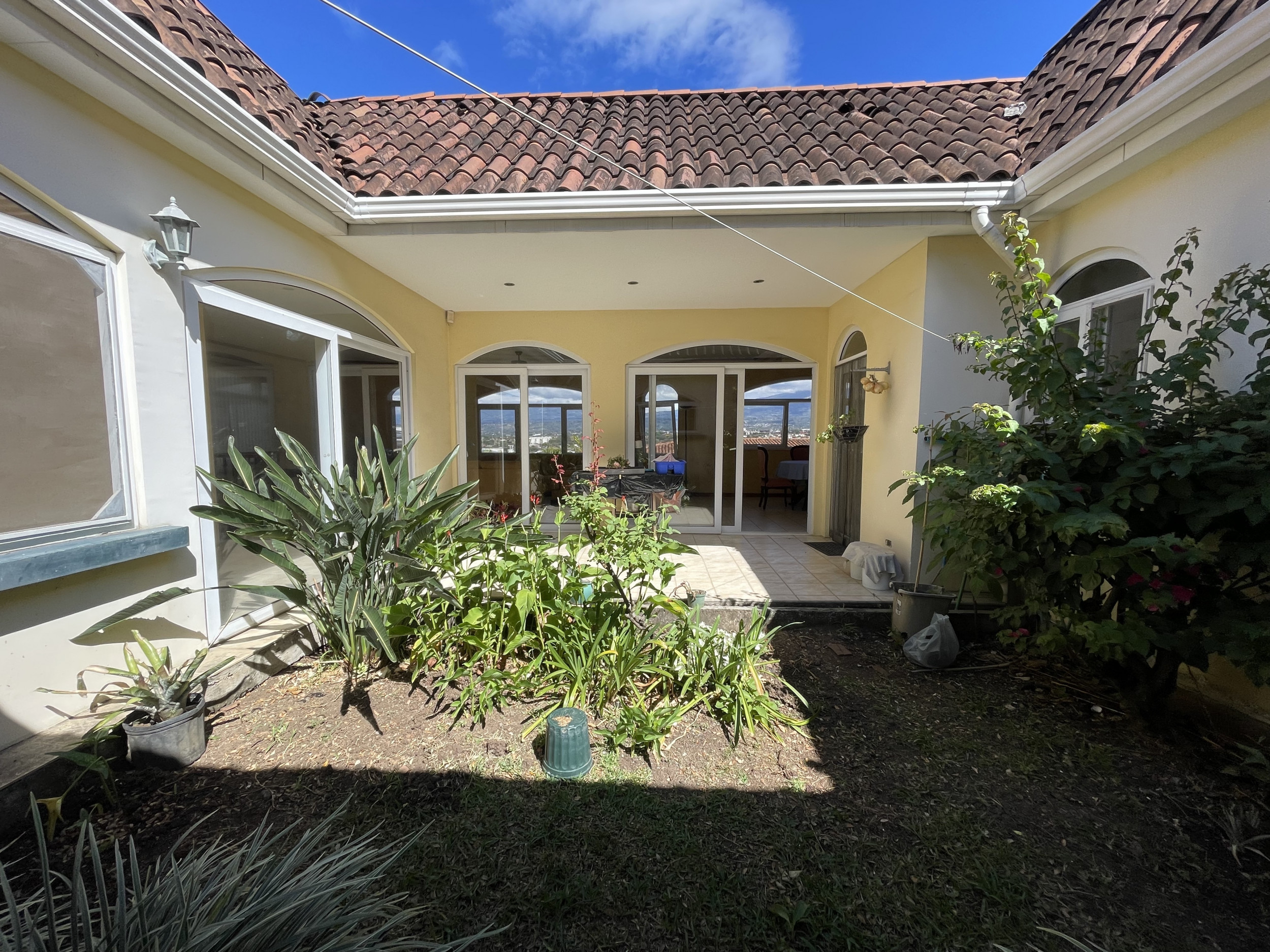 Panoramic Elegance in Guachipelín: Stunning Townhouse with Views and Community Amenities SOLD