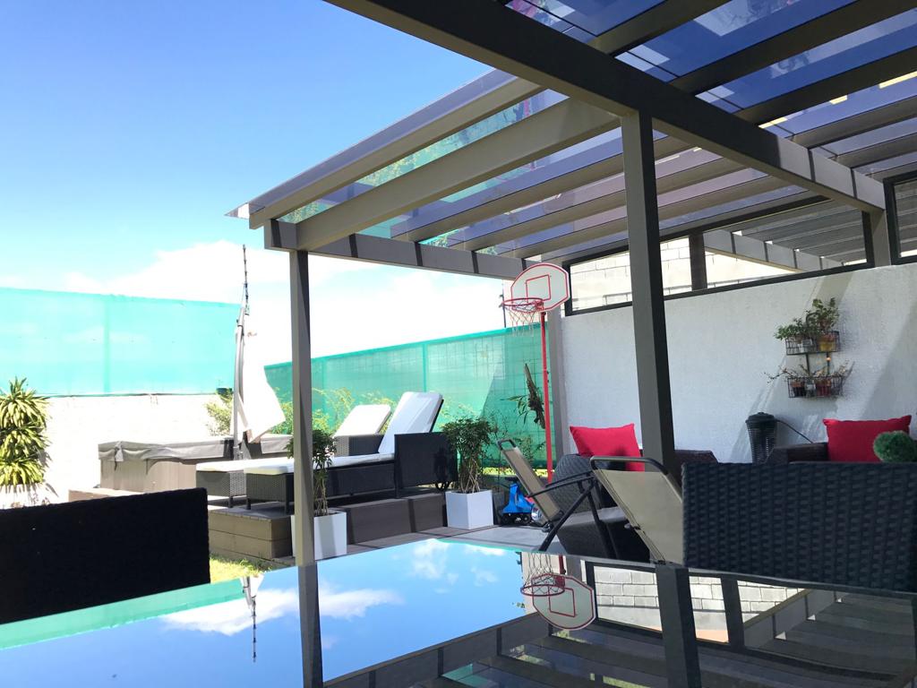 A contemporary residence located in Guachipilín Norte condominium is now available for sale SOLD