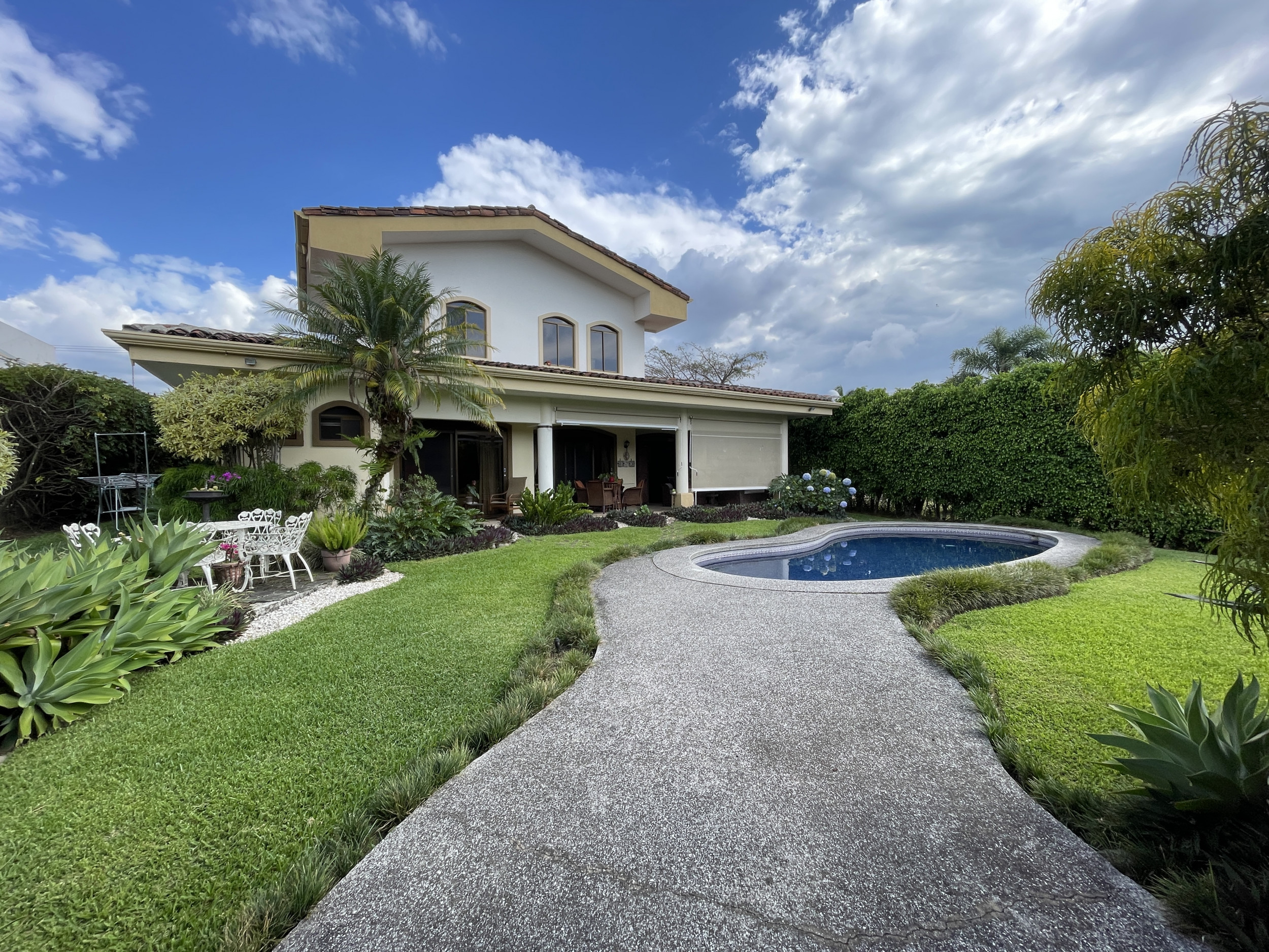 SOLD Sophisticated Living: Elegant Two-Story Residence in Lindora's Premier Gated Community with Private Garden Oasis