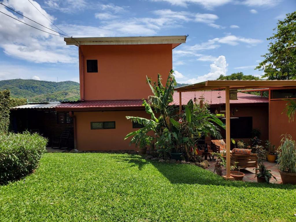Nature-Enveloped Elegance: 3BR Home with Views in Ciudad Colon, Only 6 Blocks from the Center