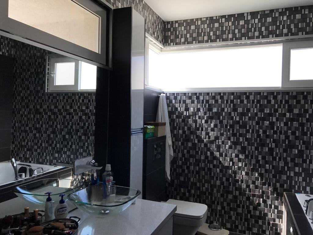 A contemporary residence located in Guachipilín Norte condominium is now available for sale SOLD