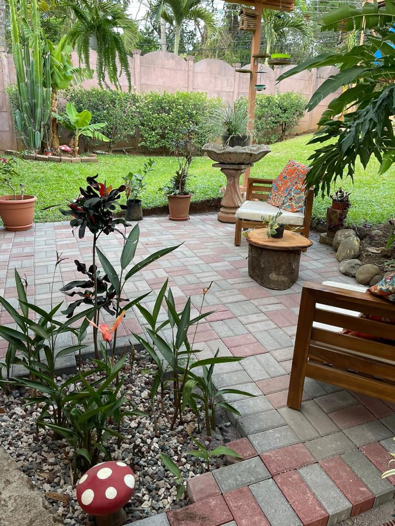 Nature-Enveloped Elegance: 3BR Home with Views in Ciudad Colon, Only 6 Blocks from the Center