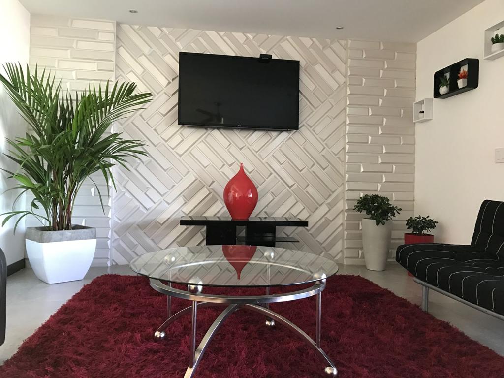 A contemporary residence located in Guachipilín Norte condominium is now available for sale SOLD