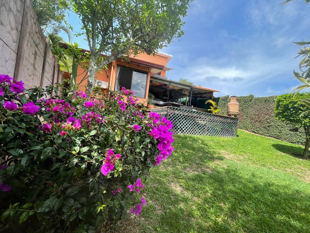 Nature-Enveloped Elegance: 3BR Home with Views in Ciudad Colon, Only 6 Blocks from the Center