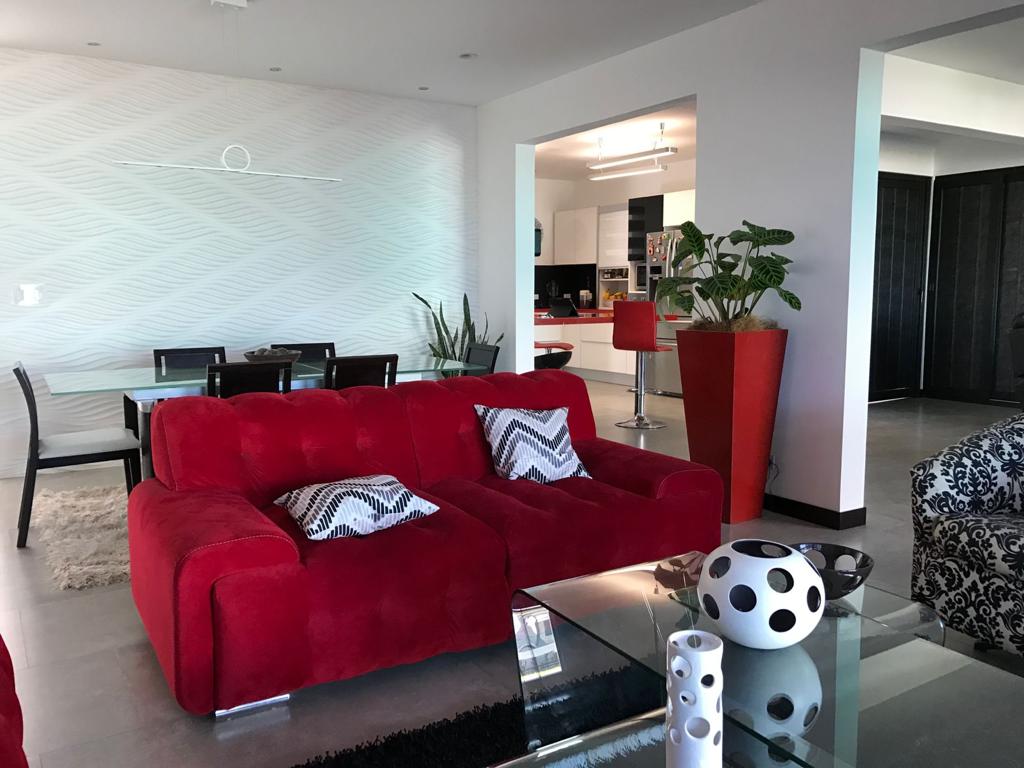 A contemporary residence located in Guachipilín Norte condominium is now available for sale SOLD
