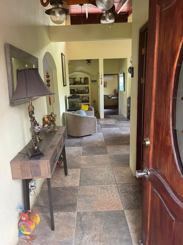 Nature-Enveloped Elegance: 3BR Home with Views in Ciudad Colon, Only 6 Blocks from the Center