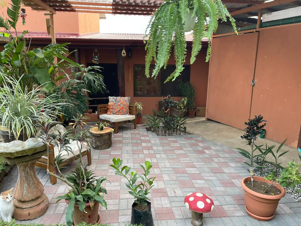Nature-Enveloped Elegance: 3BR Home with Views in Ciudad Colon, Only 6 Blocks from the Center