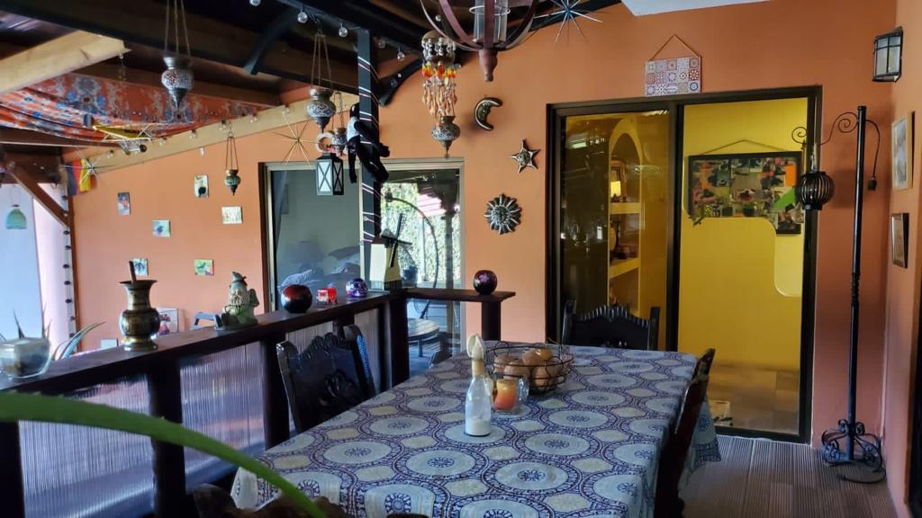 Nature-Enveloped Elegance: 3BR Home with Views in Ciudad Colon, Only 6 Blocks from the Center