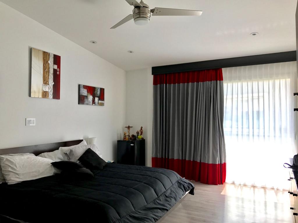 A contemporary residence located in Guachipilín Norte condominium is now available for sale SOLD