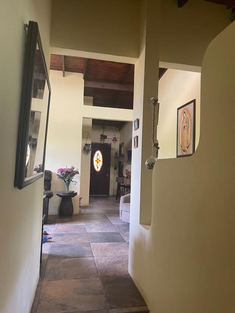 Nature-Enveloped Elegance: 3BR Home with Views in Ciudad Colon, Only 6 Blocks from the Center