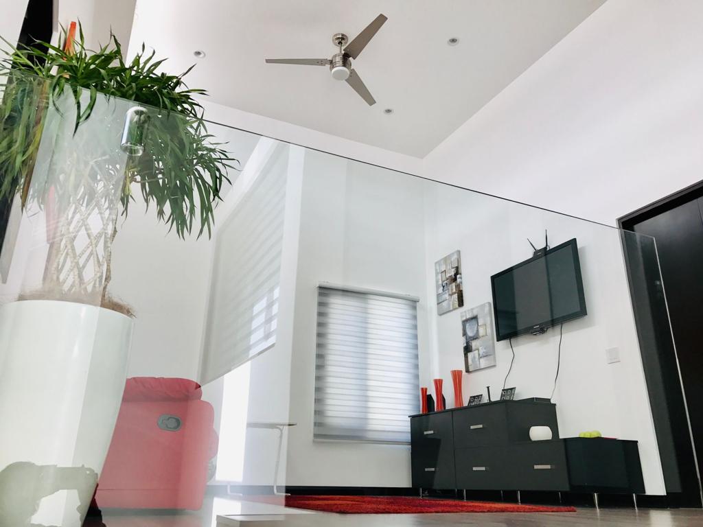 A contemporary residence located in Guachipilín Norte condominium is now available for sale SOLD